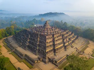 The Majestic Sunrise Over Borobudur Temple In Indonesia Wallpaper