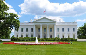 The Majestic White House, A Symbol Of Leadership And Power, Stands Tall In Washington Dc, Usa. Wallpaper