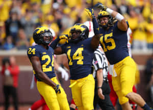 The Michigan Wolverines Ready To Take The Field Wallpaper