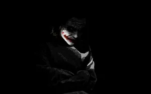 The Powerful Desolation Of The Sad Joker Wallpaper