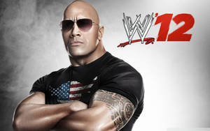 The Rock Wows The Crowd With His Wrestling Prowess Wallpaper