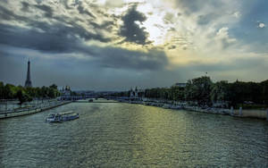 The Seine River At Night In Paris Wallpaper