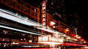 The Spectacular Skyline Of Chicago At Night Wallpaper