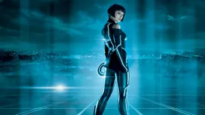 The Vibrant Lights Dance In The Darkness Of The Tron Legacy World Wallpaper