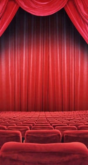 Theater With Red Seats And Curtains Wallpaper