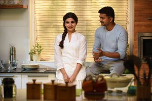 Theri Movie - A Charming Scene Of Love In The Kitchen Wallpaper