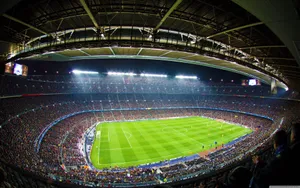 Thousands Flock To The Soccer Stadium To Cheer On Their Favorite Team Wallpaper