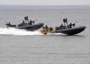 Three U S Navy Dinghies On A Mission Wallpaper