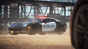 Thrilling Police Chase In Need For Speed Payback Wallpaper