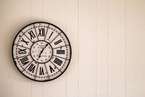 Timeless Elegance - Vintage Wall Clock Wallpaper