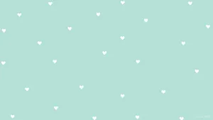 Tiny Hearts On Pastel Green Wallpaper