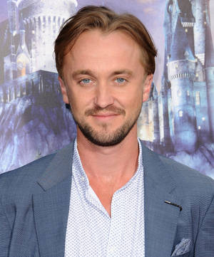 Tom Felton At Wizarding World Wallpaper