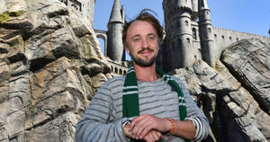 Tom Felton In Castle Background Hd Wallpaper