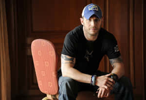 Tom Hardy Sitting Blue Cap Wallpaper