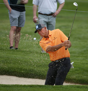 Tom Lehman Spattering Dirt While Swinging Wallpaper