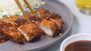 Tonkatsu Cutlet With Sauce On Top Wallpaper