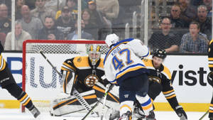 Torey Krug Tries To Goal Against Bruins Wallpaper
