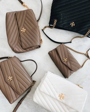 Tory Burch Neutral Handbags Wallpaper