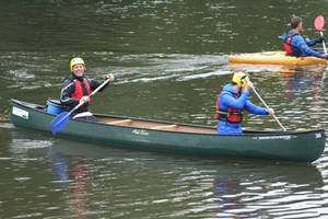 Tourist In Canoe Wallpaper