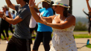 Tourists Doing Tai Chi Wallpaper