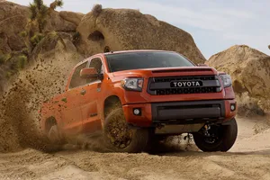 Toyota Trd Driving Through Rough Terrain Wallpaper