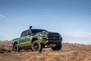 Toyota Trd In Metallic Army Green Wallpaper