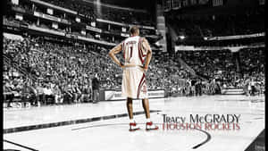 Tracy Mcgrady Playing For Nba Team Orlando Magic Wallpaper
