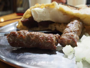 Traditional Balkan Dish - Juicy Cevapi Sausages Wallpaper