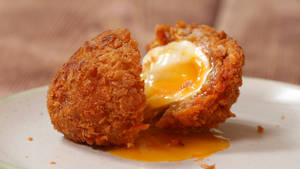 Traditional British Crispy Deep-fried Scotch Egg Wallpaper