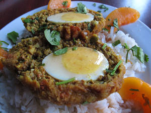 Traditional British Scotch Egg Dish On Rice Wallpaper