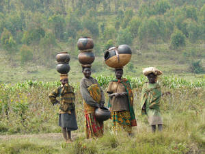 Traditional Burundi Women In Vibrant Attire Wallpaper