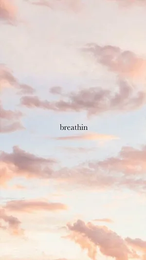 Tranquil Moment Of Deep Breathing Wallpaper