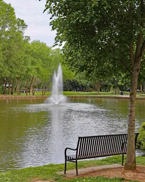 Tranquil Park Scenewith Fountain Wallpaper