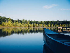 Translucent Lake With Boat Wallpaper