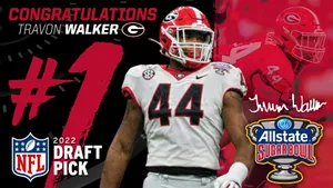 Travon Walker Celebrates Being 2022 Nfl Number 1 Pick Wallpaper