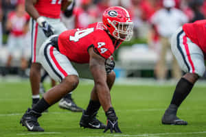 Travon Walker In Starting Line Position Wallpaper