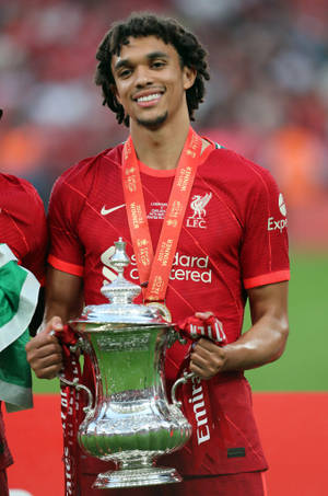 Trent Alexander-arnold Holding Trophy Wallpaper