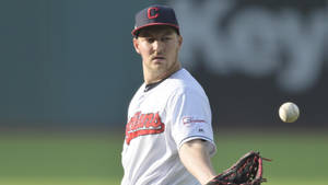 Trevor Bauer Looking At Baseball Wallpaper