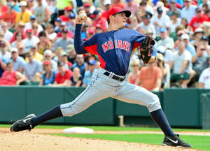 Trevor Bauer Throwing Ball Blue Red Uniform Wallpaper