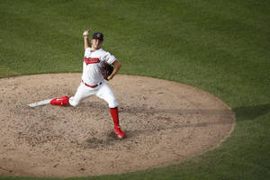 Trevor Bauer Throwing Baseball On Deck Circle Wallpaper