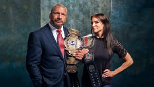 Triple H With Wife Stephanie Mcmahon Levesque Wallpaper