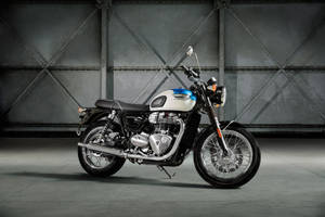 Triumph Bonneville T100 In Blue & White Wallpaper