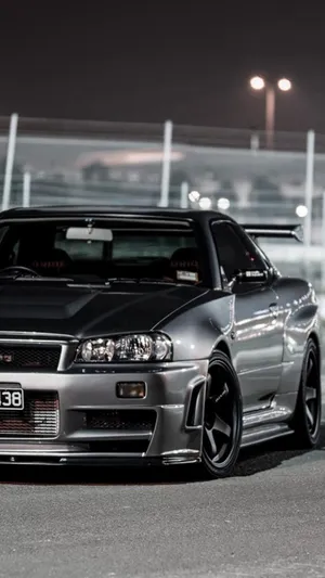 Turn Heads In The Sleek And Powerful Nissan Skyline. Wallpaper