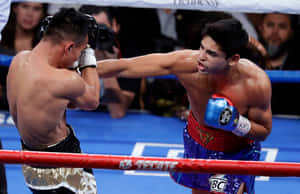 Two Boxers In A Boxing Ring Wallpaper