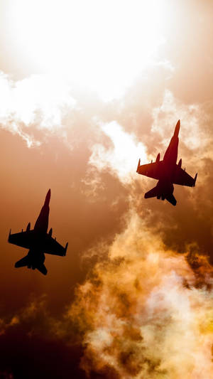 Two Jets Flying In The Sky Wallpaper