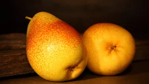 Two Reddish Pear Fruits Wallpaper