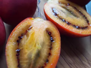 Two Sliced Red Tamarillo Photography Wallpaper