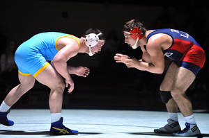 Two Wrestling Hopefuls Preparing For Their Big Match Wallpaper