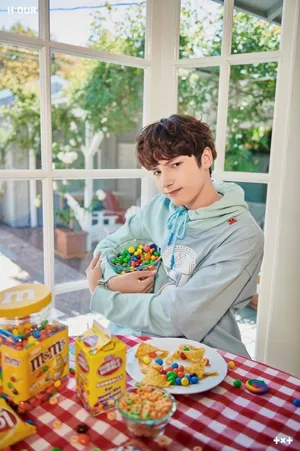 Txt Huening Kai With Candies Wallpaper