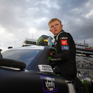 Ty Gibbs Sitting On Car Window Wallpaper